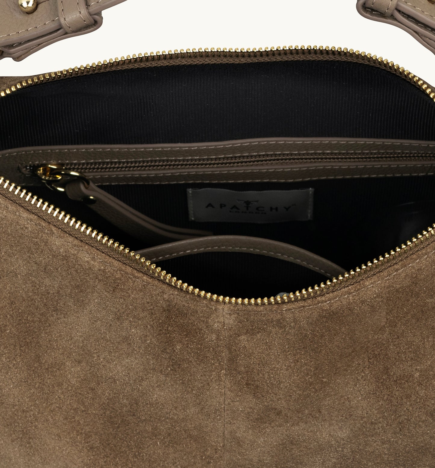The Charlie mushroom suede bag featuring soft suede texture, a relaxed silhouette, and practical design for everyday elegance-5