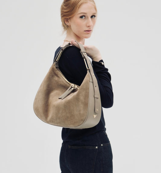 The Charlie mushroom suede bag featuring soft suede texture, a relaxed silhouette, and practical design for everyday elegance