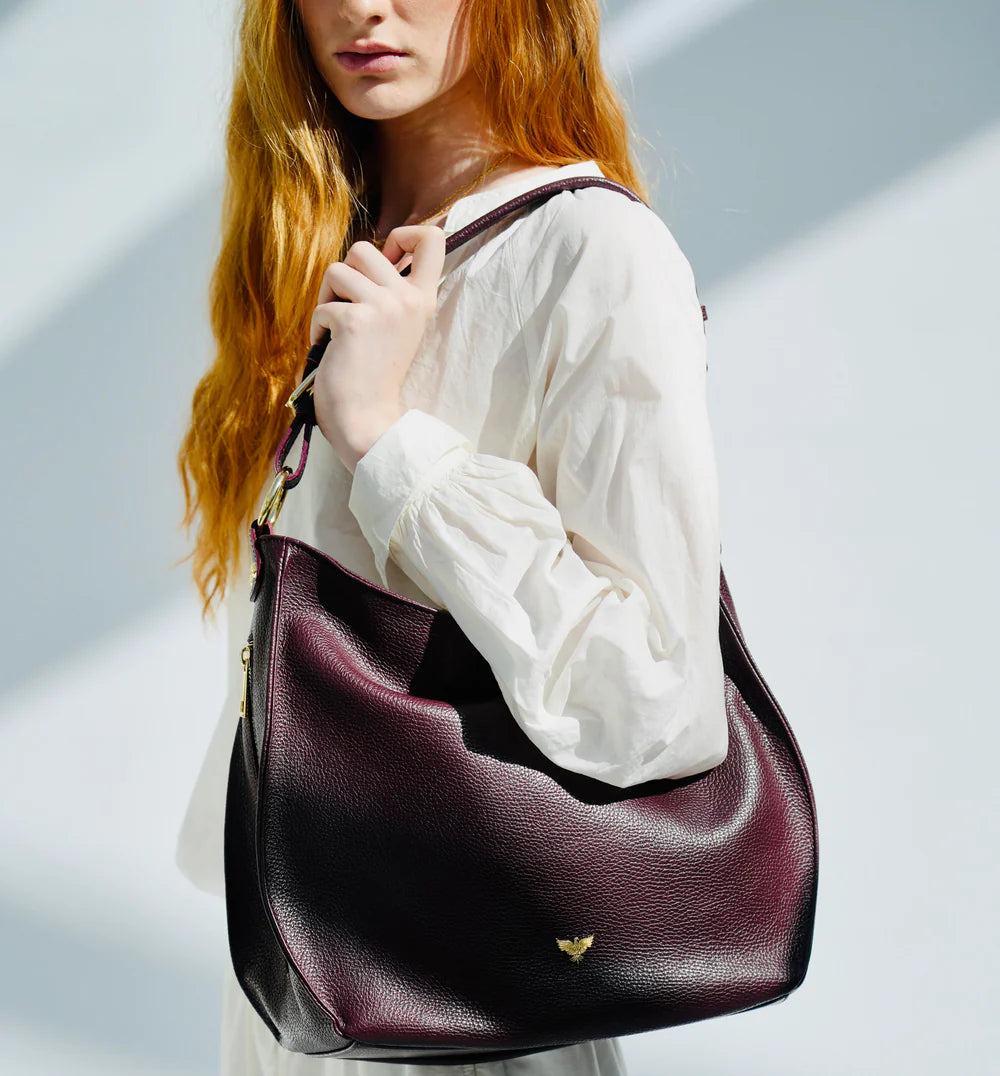 The Harriet tan leather hobo bag featuring a timeless, slouchy design with elegant detailing and everyday functionality-2