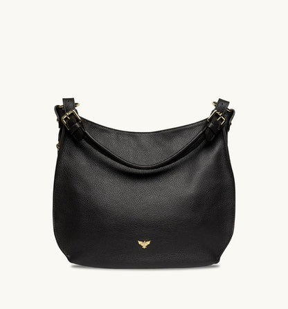 The Harriet tan leather hobo bag featuring a timeless, slouchy design with elegant detailing and everyday functionality-4