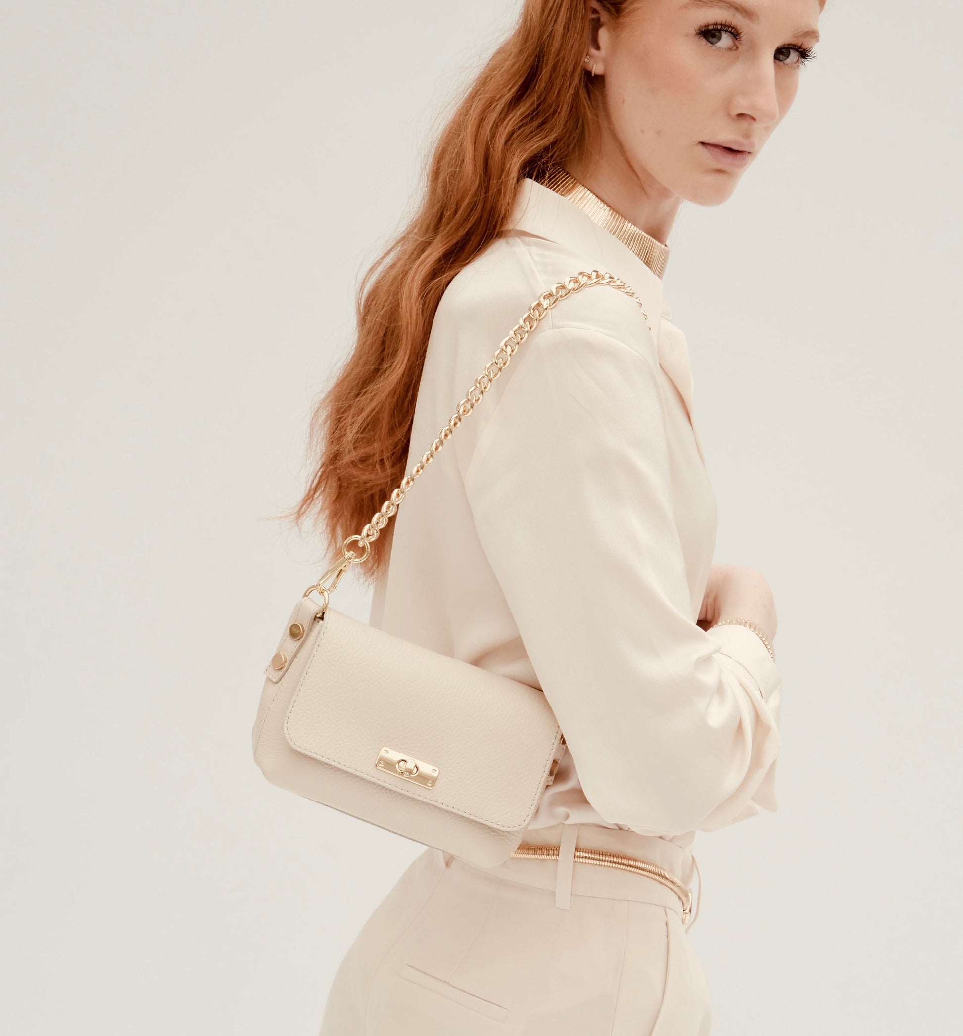 The Maisie stone leather bag with a timeless silhouette, elegant stone-colored finish, and functional design for everyday use-1