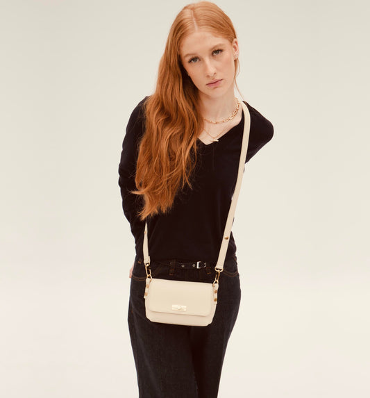 The Maisie stone leather bag with a timeless silhouette, elegant stone-colored finish, and functional design for everyday use