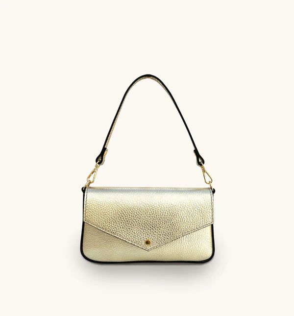 The Munro black leather shoulder bag featuring a sleek, sophisticated design with versatile compartments for everyday use-1