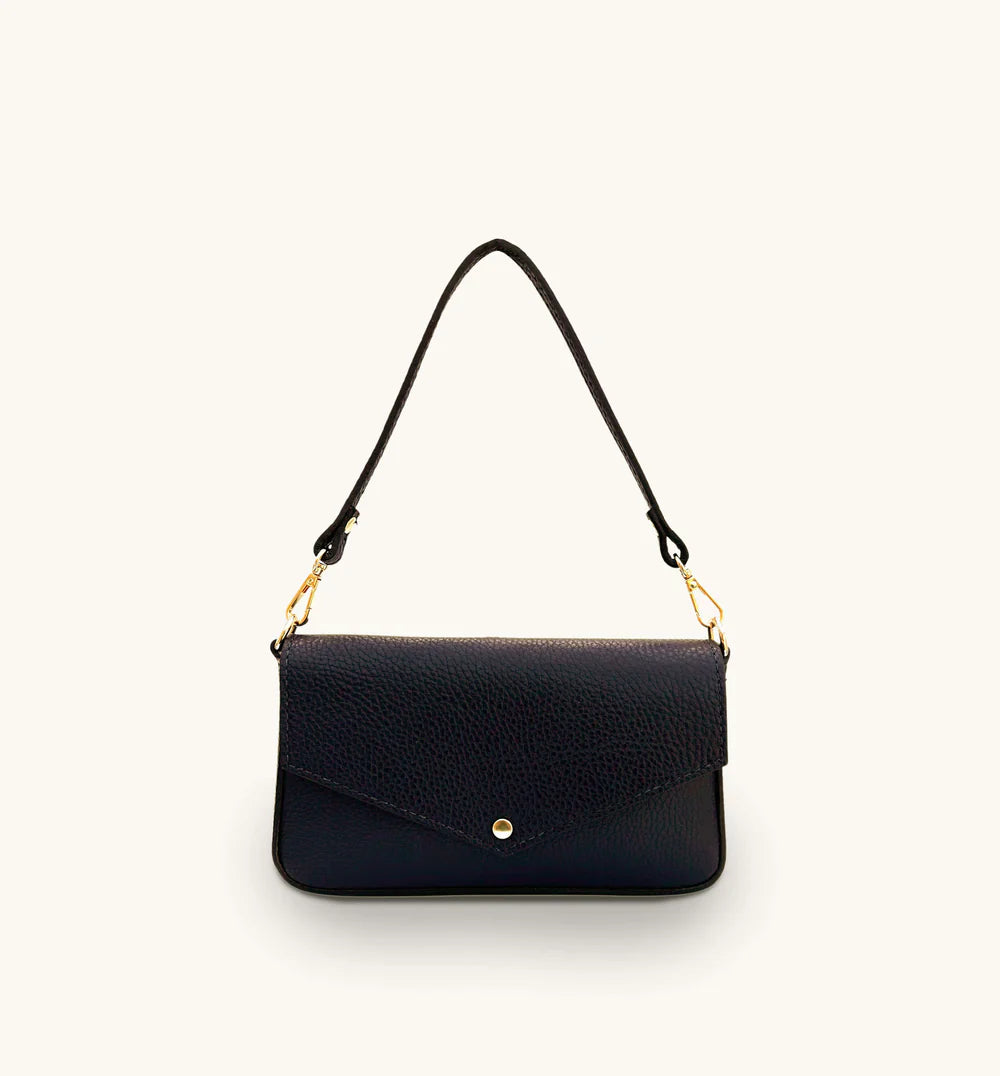 The Munro black leather shoulder bag featuring a sleek, sophisticated design with versatile compartments for everyday use-2