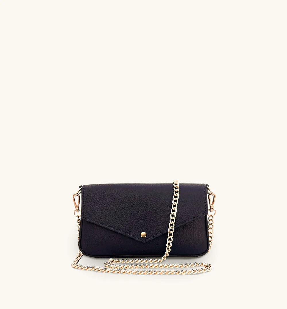 The Munro black leather shoulder bag featuring a sleek, sophisticated design with versatile compartments for everyday use-3