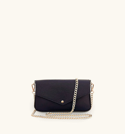 The Munro black leather shoulder bag featuring a sleek, sophisticated design with versatile compartments for everyday use-3