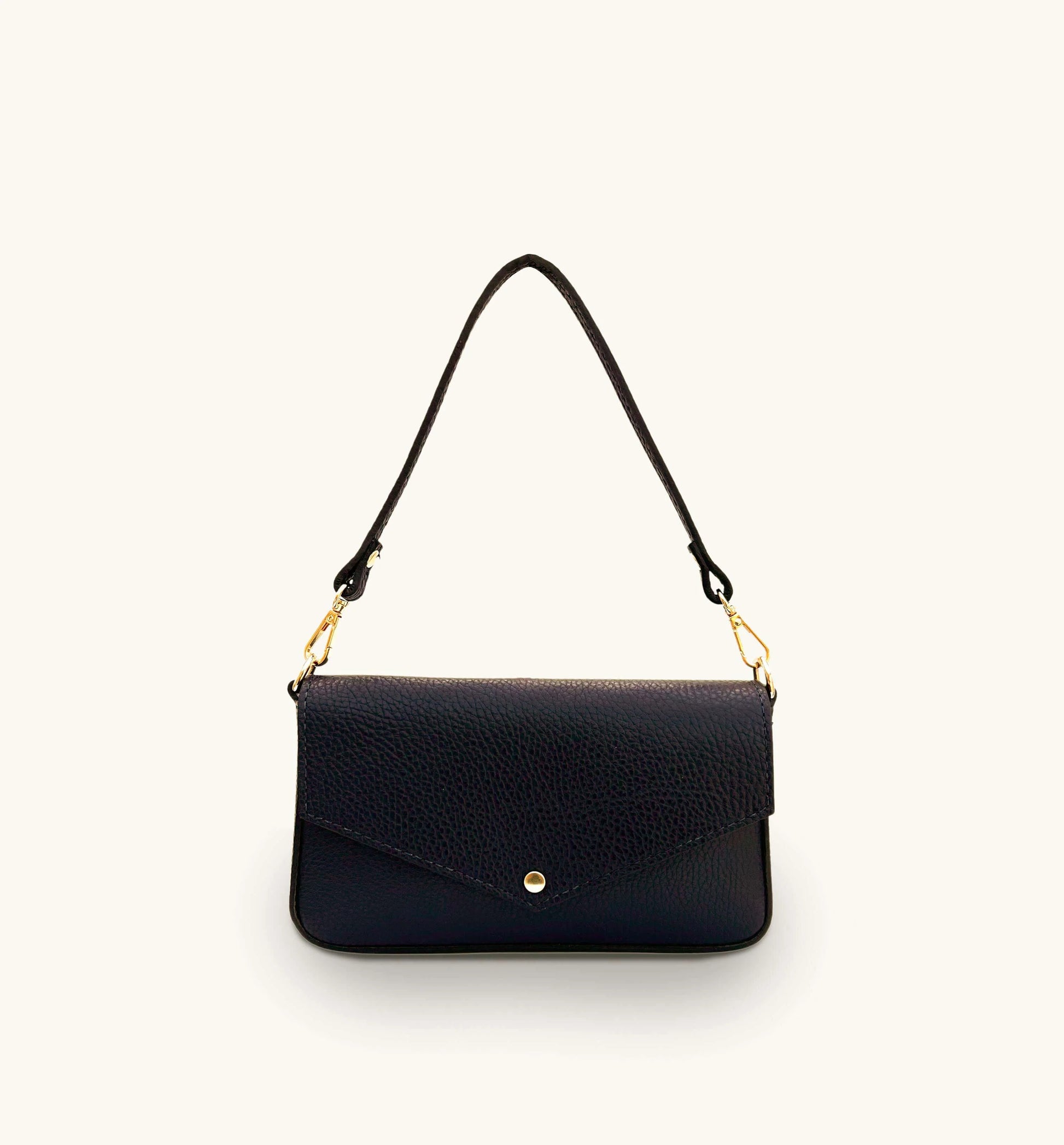 The Munro black leather shoulder bag featuring a sleek, sophisticated design with versatile compartments for everyday use-8
