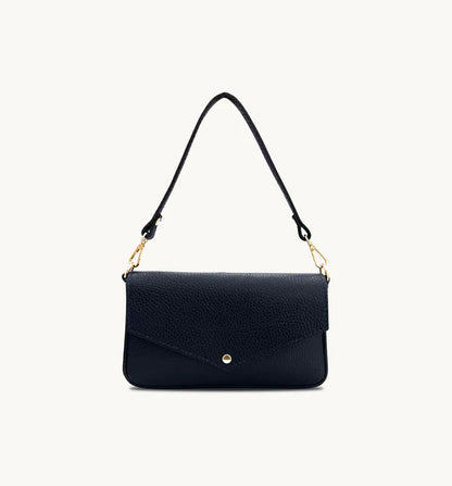 The Munro black leather shoulder bag featuring a sleek, sophisticated design with versatile compartments for everyday use-9